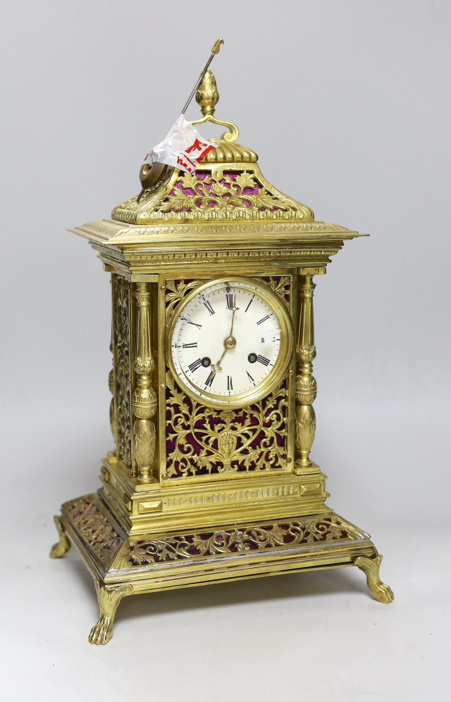 A French cast brass mantel clock in period style, 42cms high